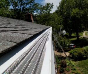 clean gutter with gutter guards installed